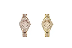 Detail view of crystal-encrusted ladies' Roman numeral watches in rose gold and gold finishes