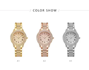 Close-up of three sparkling rhinestone watches in gold, rose gold and silver colors
