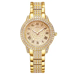Elegant gold ladies watch with full rhinestones and roman numerals on white background