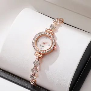 Rose gold quartz bracelet watch for women with clover diamond links and crystals