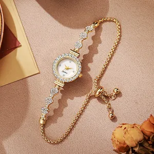 Elegant gold women's watch with flower diamond bracelet and adjustable pull-chain buckle