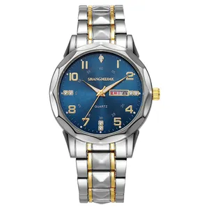 Detailed close-up of blue textured watch face with gold markers and day-date window