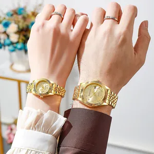Classic gold couple watches with fluted bezel and Jubilee bracelet for formal wear
