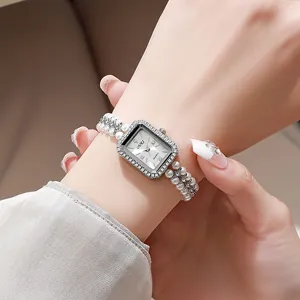 Vintage pearl chain bracelet watch for women with rectangular rhinestone dial and OUKI quartz movement
