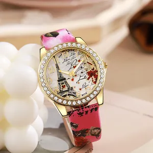 Montre à quartz femme avec cadran Tour Eiffel, lunette en strass et bracelet cuir floral rose