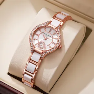 Detailed close-up of rose gold watch with ceramic strap and diamond-encrusted bezel