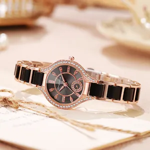 Detailed close-up of rose gold watch with ceramic band and crystal bezel decoration