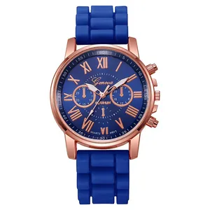 Macro shot of Geneva watch showing blue silicone strap texture and rose gold case detail