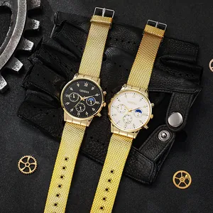 Dettaglio degli orologi al quarzo da uomo Geneva con cinturini a maglia dorati e quadranti