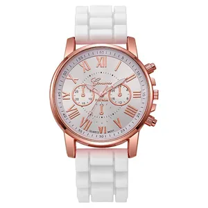 Detail of rose gold case and white silicone strap with cube texture on Geneva watch