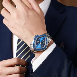 Men's business quartz watch with unique triangular blue dial and steel strap on wrist