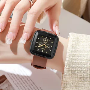 Square black fashion quartz watch for women with golden markers and brown silicone strap