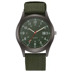Detail of military quartz watch with green nylon strap and 24-hour calendar dial