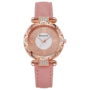 Elegant rose gold quartz watch for women with rhinestones and pink leather strap