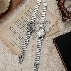 Classic silver oval quartz watch set for women with metal chain band in black and white dial