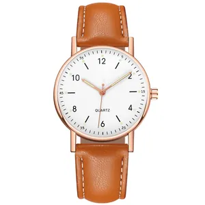 Luminous quartz watch with minimalist brown leather strap and rose gold metal case