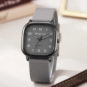 Square vintage style quartz watch with dark grey textured dial and silicone strap