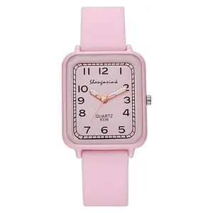 Minimalist pink square quartz watch with a matching pink silicone strap and black numerals