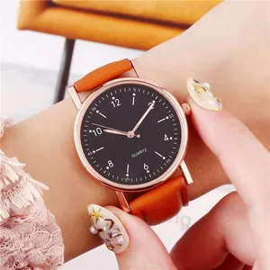 Luminous quartz watch for women with orange leather strap and rose gold case