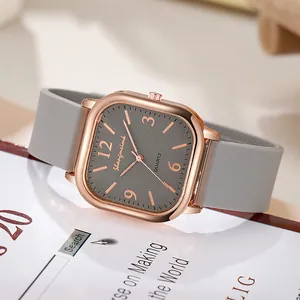 Minimalist square watch with rose gold case and grey silicone strap for women