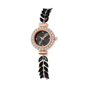 Elegant rose gold women's quartz watch with rhinestone bezel and leaf bracelet