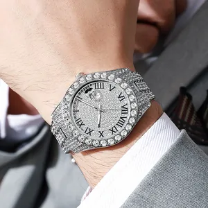 Macro detail of luxury silver iced-out watch with crystal dial and Roman numerals