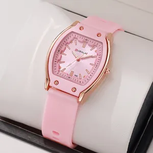 Pink silicone strap tonneau watch with rose gold bezel for women seen from a 45-degree angle
