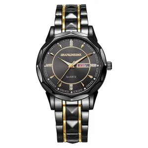 Close-up of black and gold quartz watch dial with double calendar and crystal markers