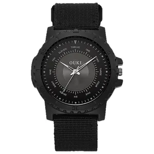 Men's black quartz sport watch with canvas nylon strap and matte resin bezel case