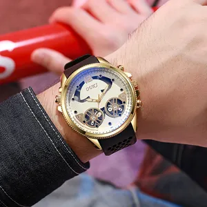 Men's hollow blue light watch with gold metal case and black mesh rubber strap worn on wrist