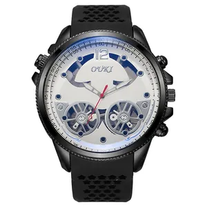 Detail of OUKI men's watch featuring a skeleton dial and perforated black rubber strap