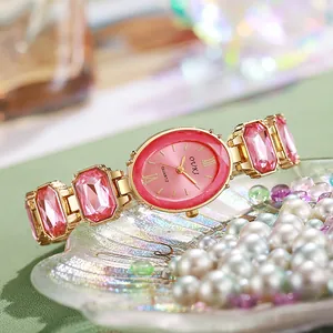 Montre quartz ovale de luxe avec pierres roses et finition dorée pour femmes