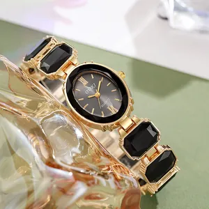 Montre Bracelet de Bijoux de Luxe pour Femme Cadran Ovale Élégant Montre à Quartz Boîtier en Alliage Doré Avec Bracelet Incrusté de Faux Cristaux Colorés