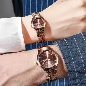Set de relojes para pareja en oro rosa con esfera marrón y función de fecha