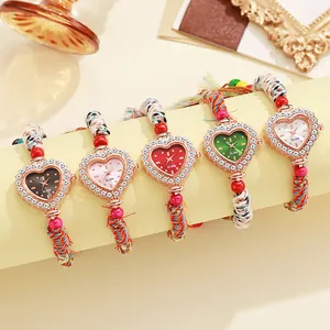 Ethnic style heart-shaped quartz watch with colorful woven strap and rhinestone bezel