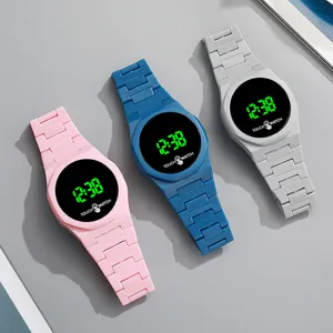 Sleek LED touch screen digital watches in pink blue and gray with matte plastic straps