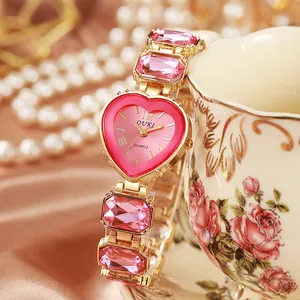 Orologio al quarzo cuore rosa con cinturino in gemme dorate e perle