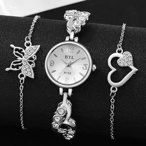 Detail of silver women watch set with butterfly bracelet and sparkling rhinestones