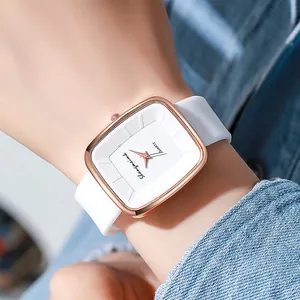 Minimalist square quartz watch with white silicone strap and rose gold metal case
