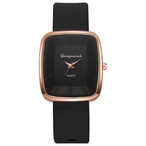 Minimalist square quartz watch with rose gold metal case and premium black silicone strap