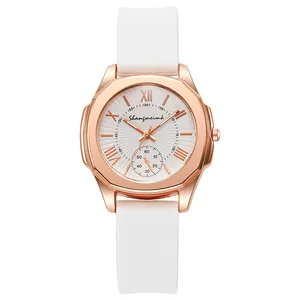 Fashionable women's quartz watch with rose gold case, white silicone strap and roman numerals