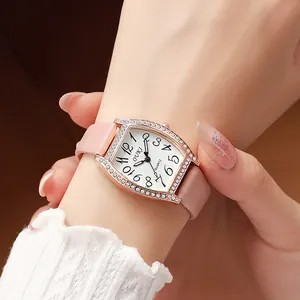 Modieus tonneau quartz horloge met diamanten bezel en roze lederen band voor dames