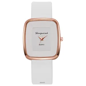 Minimalist quartz watch with white silicone strap and rose gold rectangular case