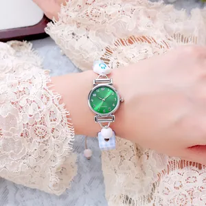 Women's quartz watch with emerald green dial and creative pearl bead bracelet strap