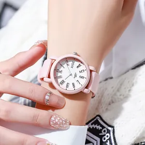 Pink silicone quartz watch for women featuring a minimalist round dial and large numbers