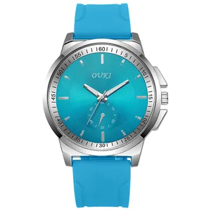 Close-up of OUKI quartz watch with sky blue dial, silver metal case and silicone strap