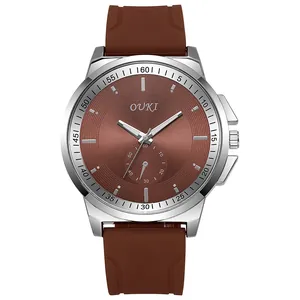 Detailed front view of OUKI men's quartz watch with brown sunburst dial and silicone strap
