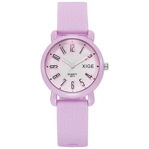 Close-up of lavender silicone watch strap with non-slip texture and silver crown