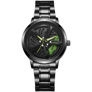 Close-up of black steel watch with a rotating car rim dial and green brake calipers