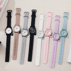 Waterproof quartz watches for students featuring silicone straps and star charms in eight colors